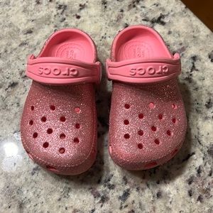 Sparkly pink baby crocs